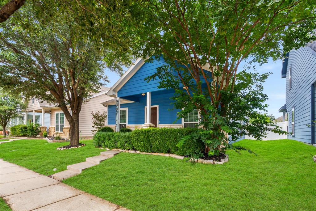 10969 Colonial Heights Lane Fort Worth, TX 76179 - Photo 3 of 34 a house that is sitting in middle of the grass