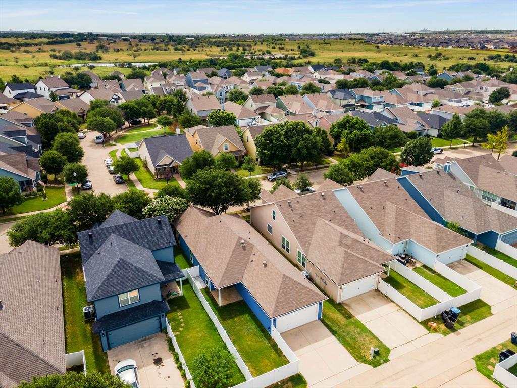 10969 Colonial Heights Lane Fort Worth, TX 76179 - Photo 33 of 34 an aerial view of residential houses with outdoor space