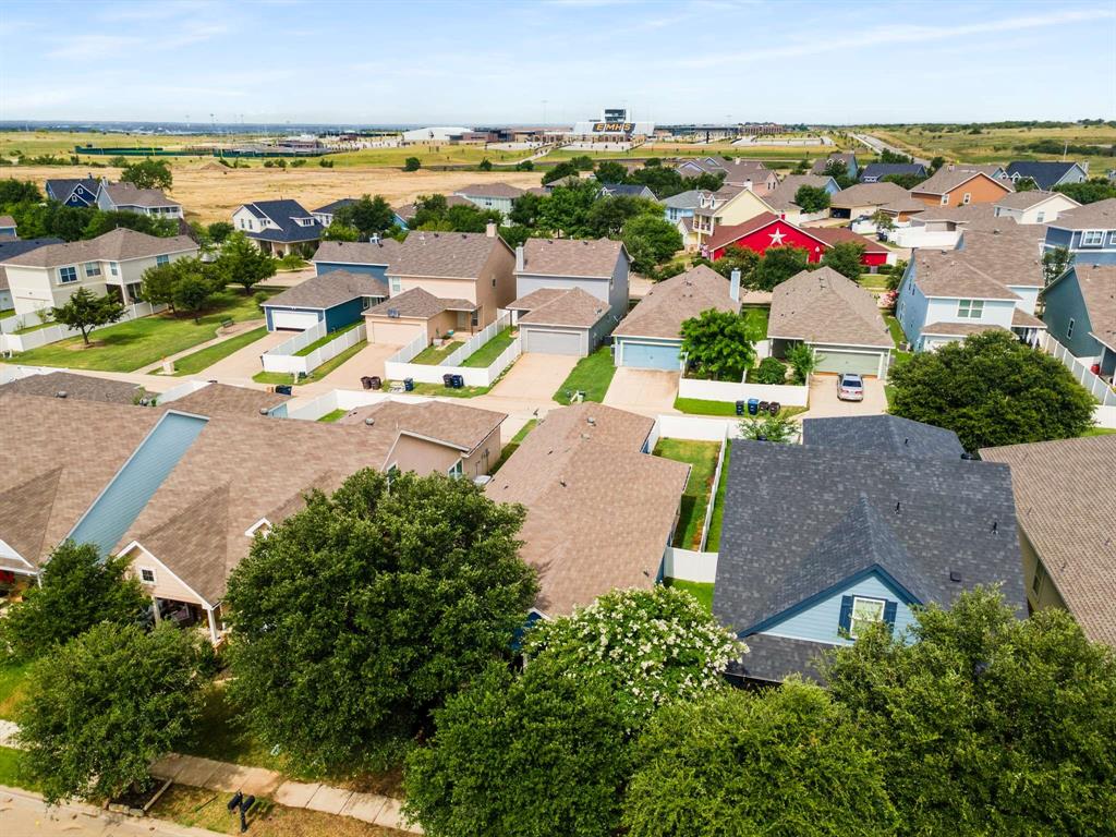 10969 Colonial Heights Lane Fort Worth, TX 76179 - Photo 34 of 34 an aerial view of residential houses with outdoor space and ocean view