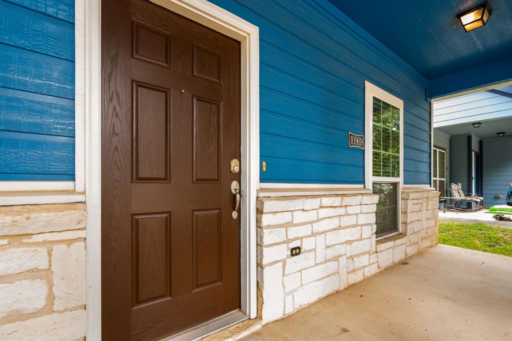10969 Colonial Heights Lane Fort Worth, TX 76179 - Photo 6 of 34 a view of front door of house