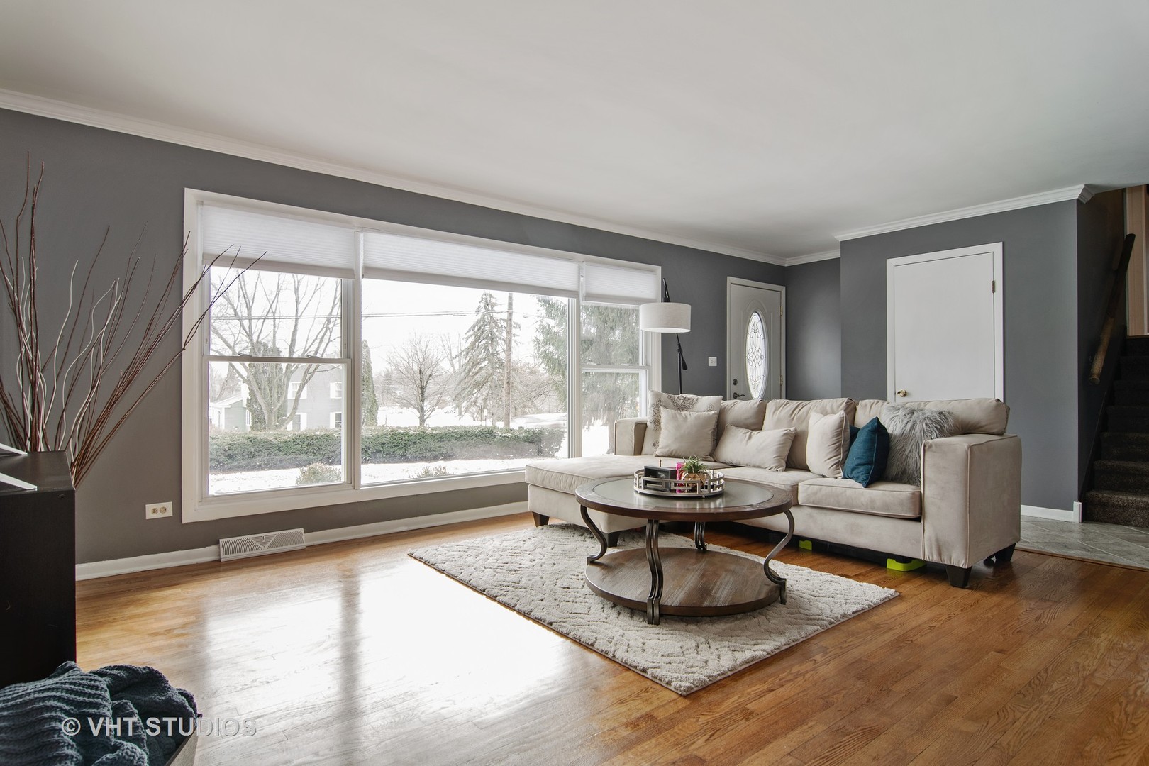 27-w084 Jewell Road Winfield, IL 60190 - Photo 2 of 16 a living room with furniture and a large window