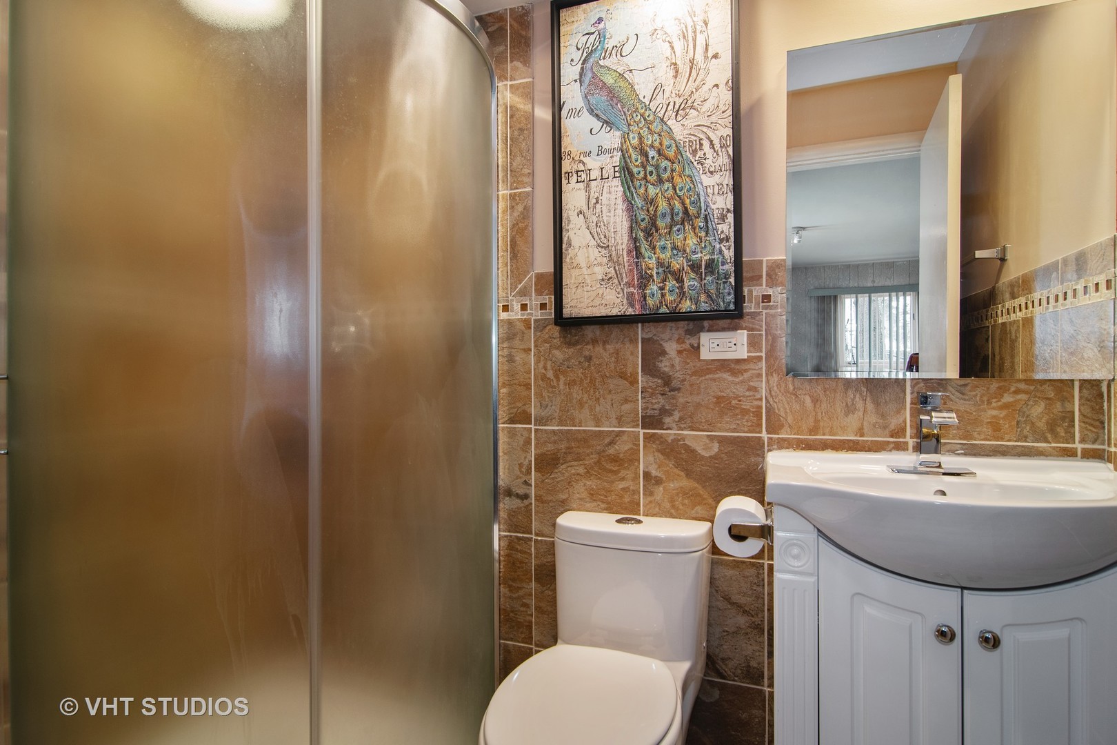 27-w084 Jewell Road Winfield, IL 60190 - Photo 11 of 16 a bathroom with a toilet sink and mirror