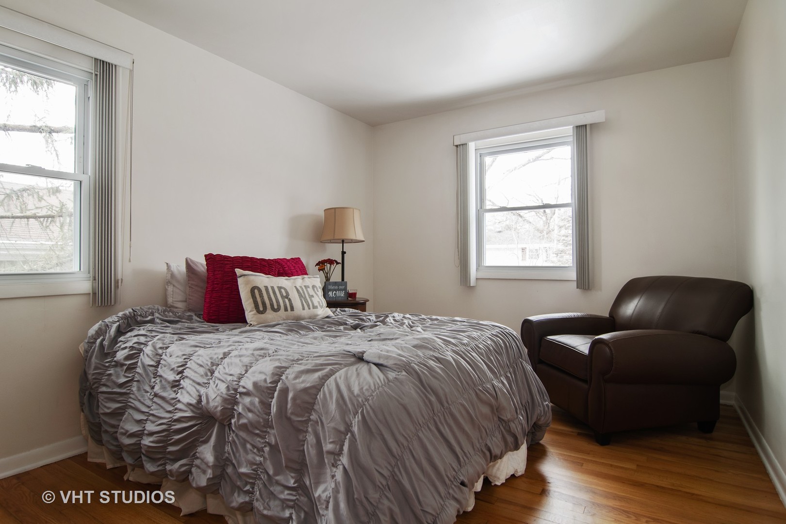 27-w084 Jewell Road Winfield, IL 60190 - Photo 12 of 16 a bedroom with a bed and a couch