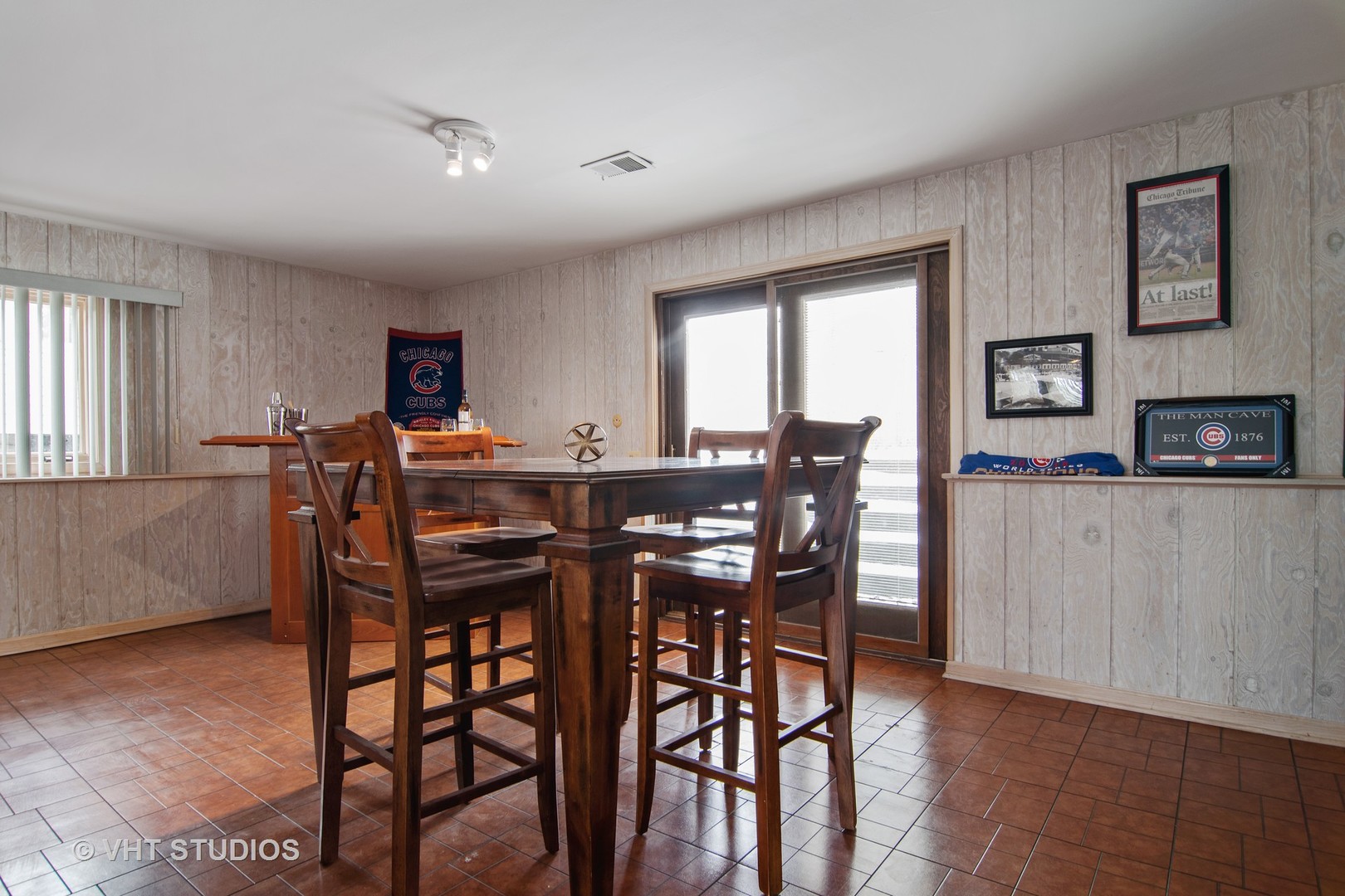 27-w084 Jewell Road Winfield, IL 60190 - Photo 14 of 16 a view of a dining room with furniture and window