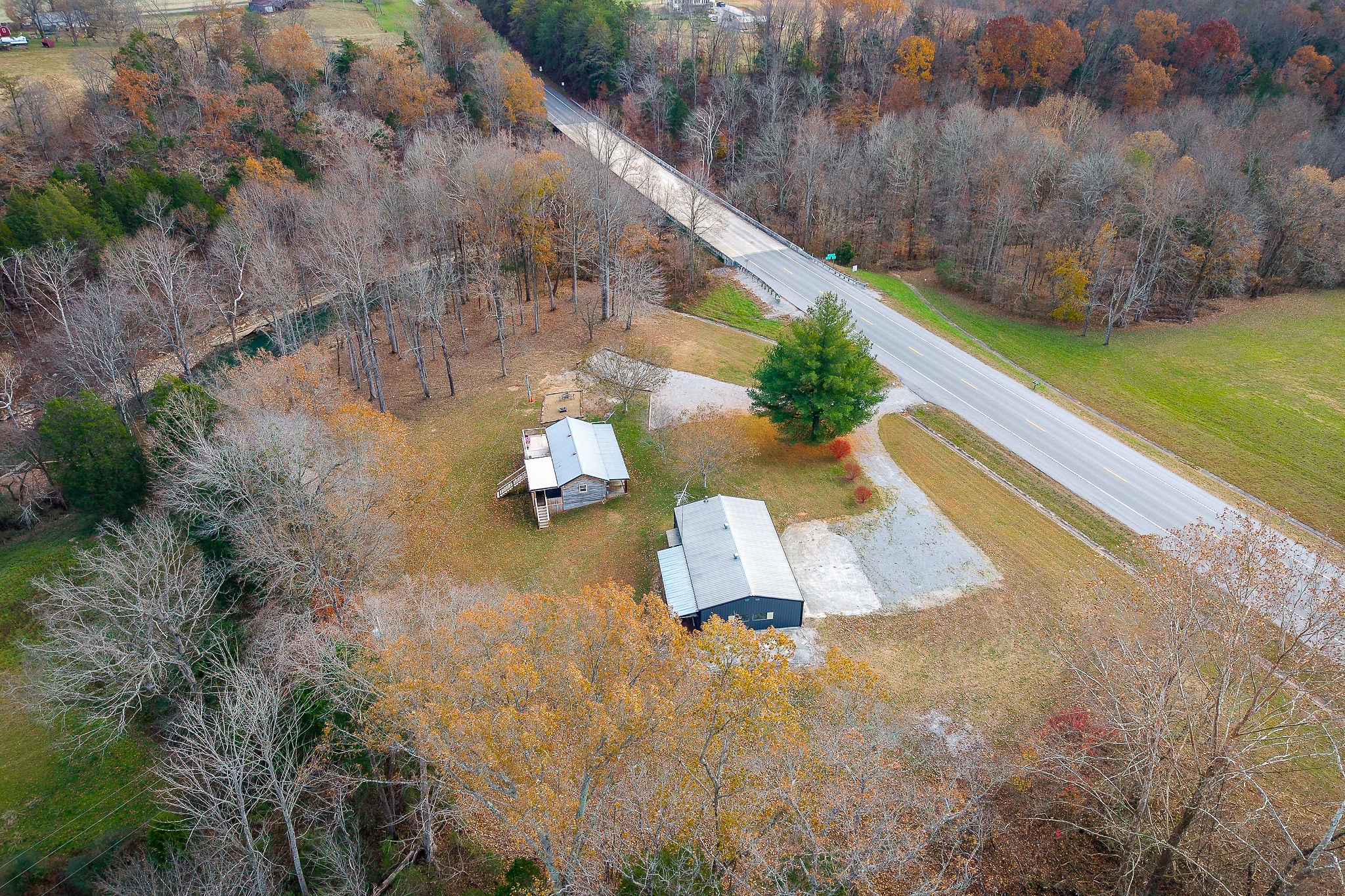 6777 Spencer Road Rock Island, TN 38581 - Photo 11 of 49 a view of a yard with large trees