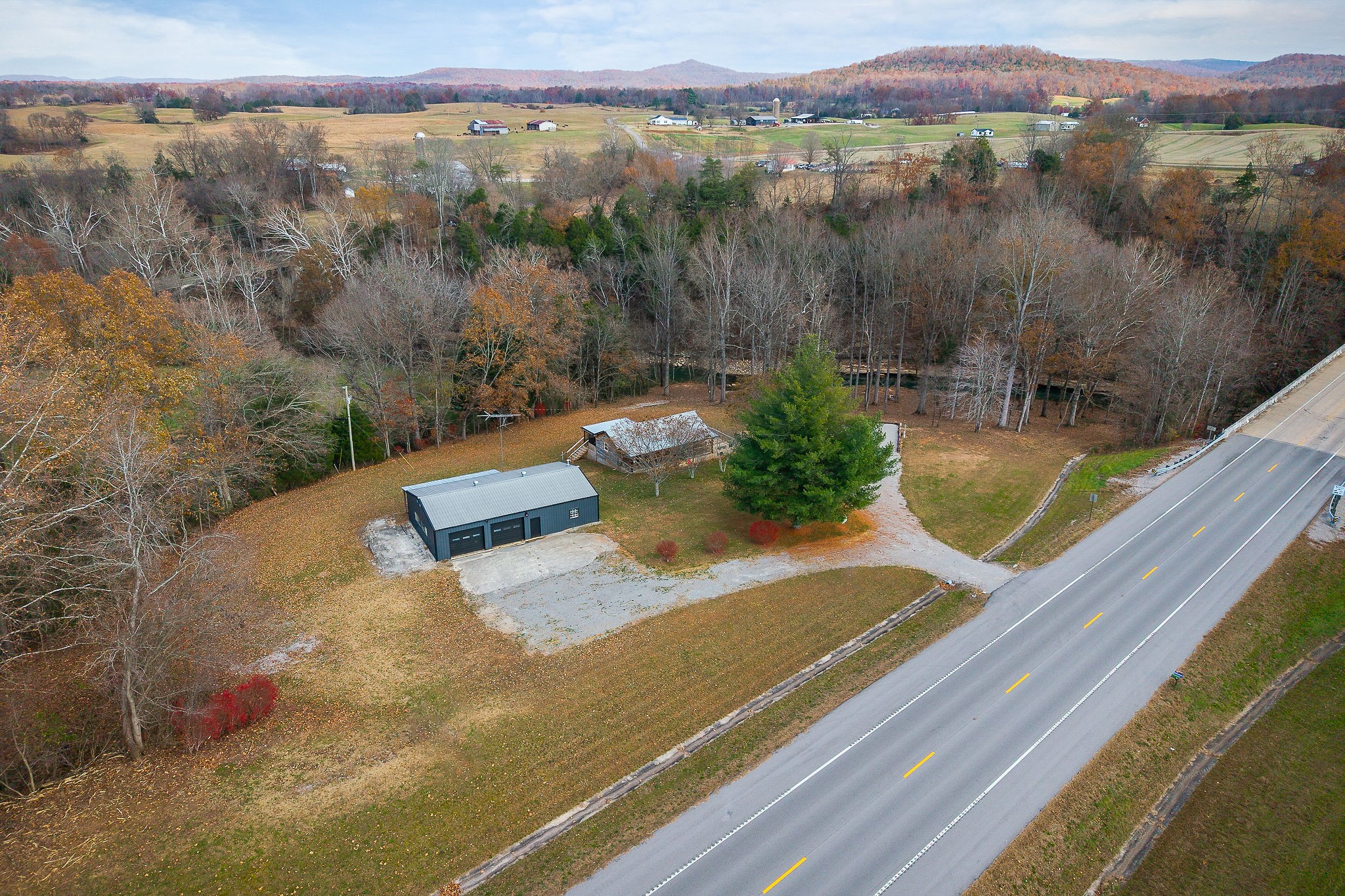 6777 Spencer Road Rock Island, TN 38581 - Photo 12 of 49 a view of a lake with a mountain