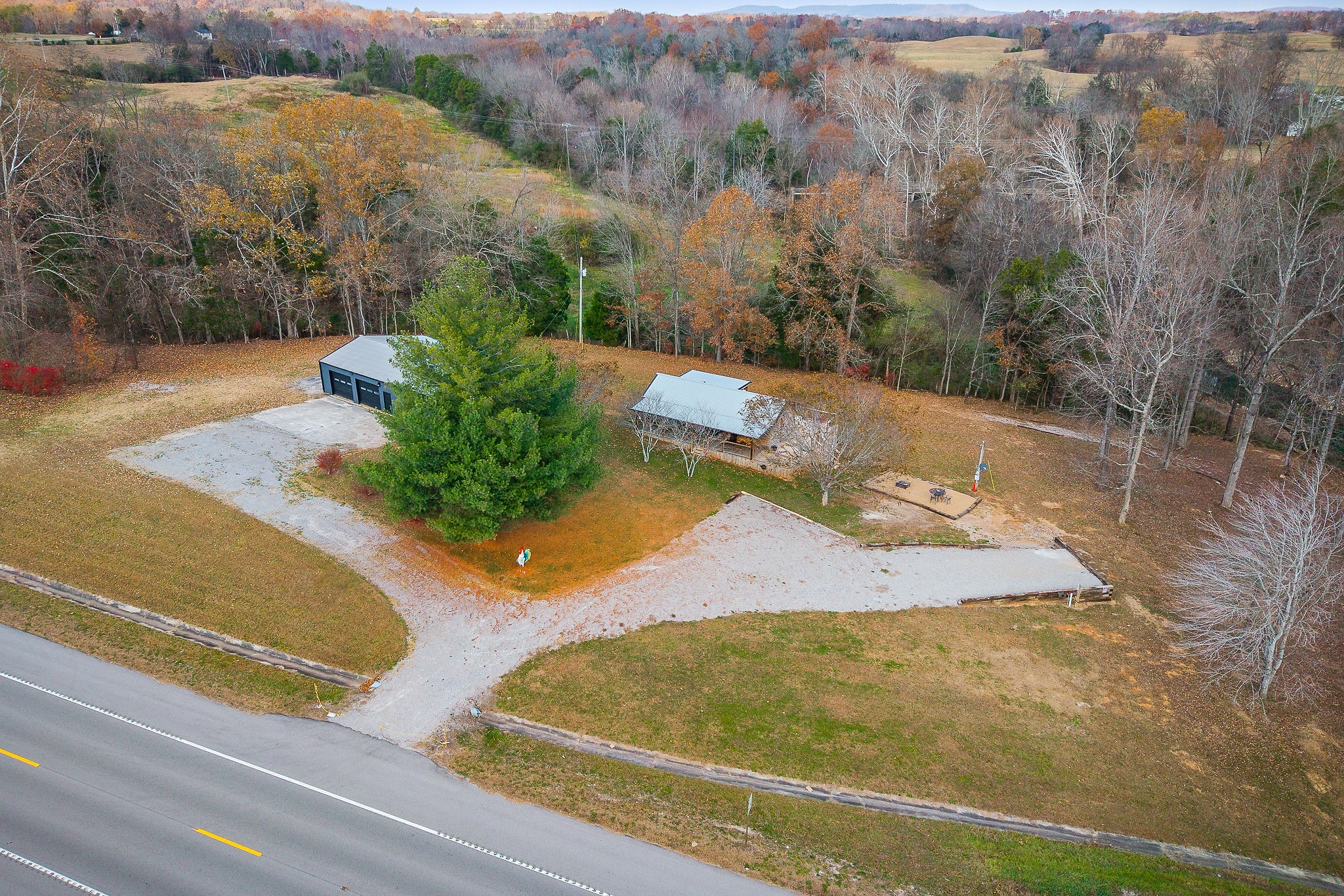 6777 Spencer Road Rock Island, TN 38581 - Photo 13 of 49 a view of a yard with an outdoor space