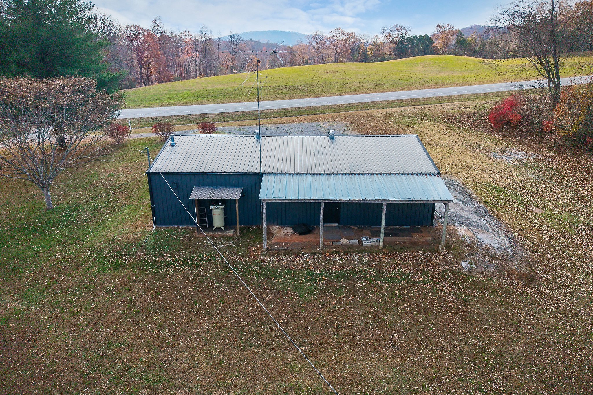 6777 Spencer Road Rock Island, TN 38581 - Photo 15 of 49 a view of a house with a swimming pool