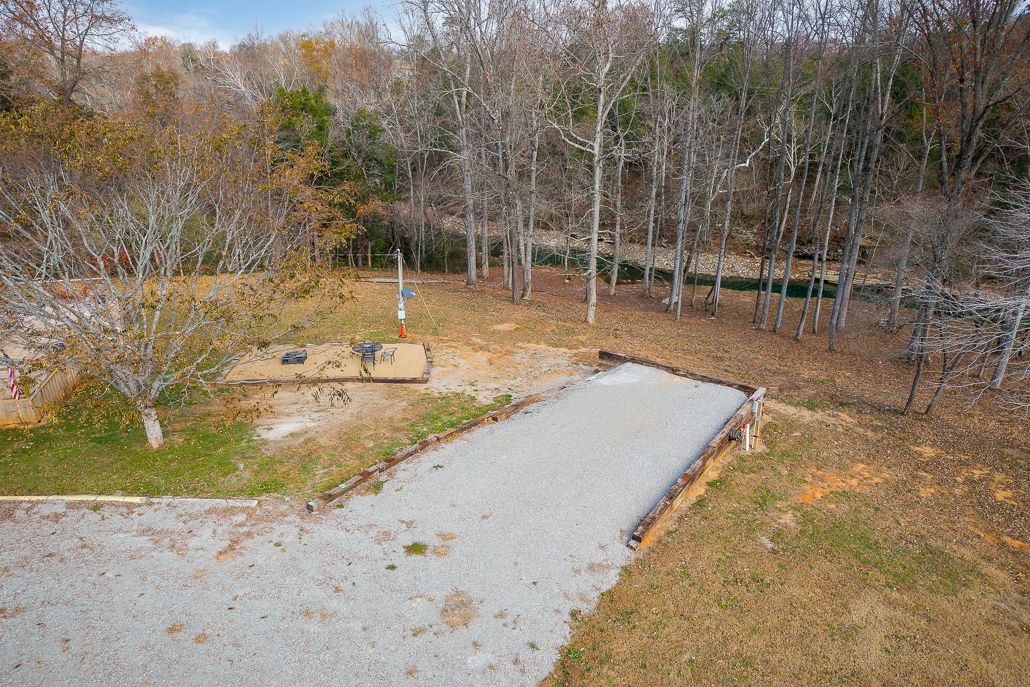6777 Spencer Road Rock Island, TN 38581 - Photo 18 of 49 a view of a swimming pool with a yard