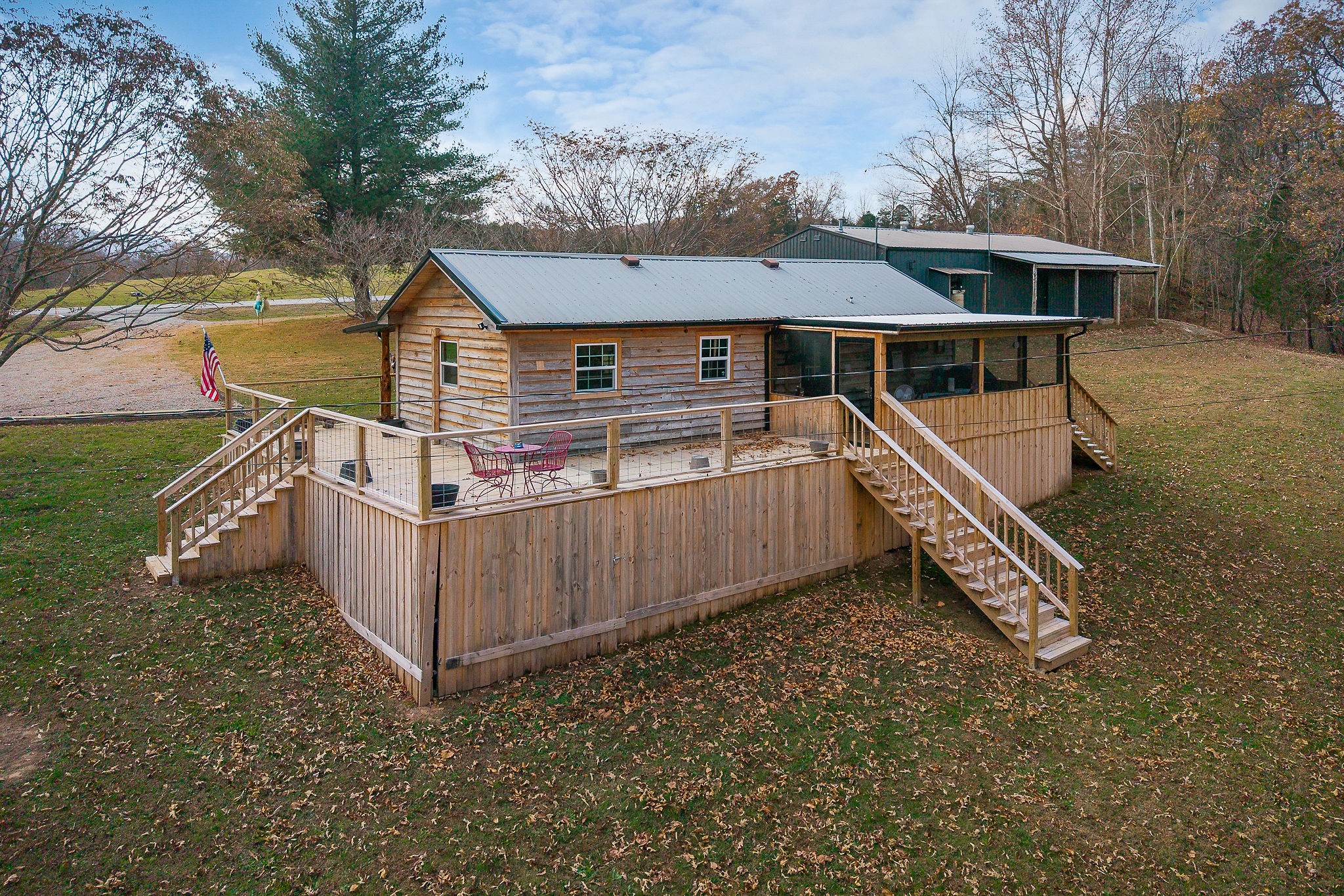 6777 Spencer Road Rock Island, TN 38581 - Photo 2 of 49 an arial view of a house with wooden fence
