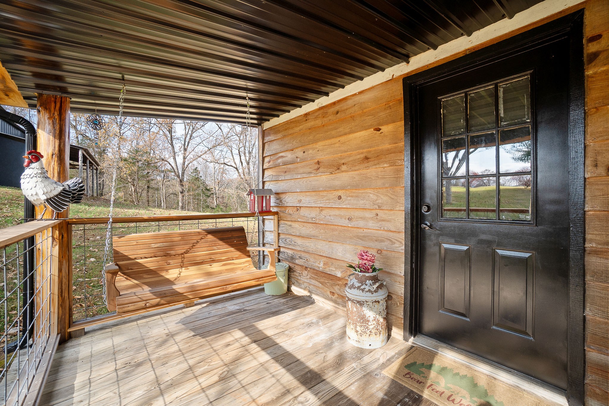 6777 Spencer Road Rock Island, TN 38581 - Photo 31 of 49 a view of a porch with a table and chairs
