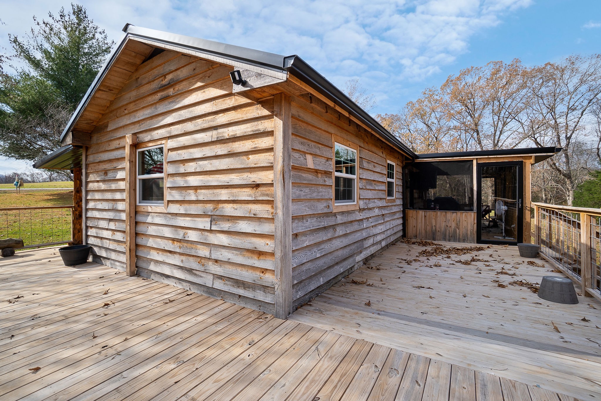 6777 Spencer Road Rock Island, TN 38581 - Photo 33 of 49 a view of a house with a yard