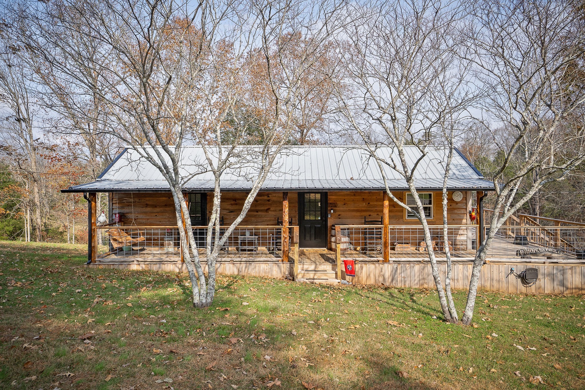 6777 Spencer Road Rock Island, TN 38581 - Photo 37 of 49 a view of a house with backyard