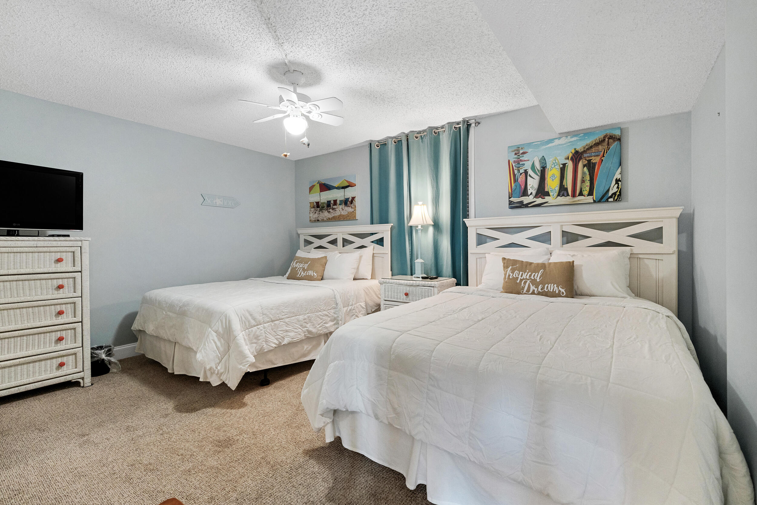 30 Moreno Point Road, Unit 303A Destin, FL 32541 - Photo 11 of 34 a bedroom with two beds and painting on the wall