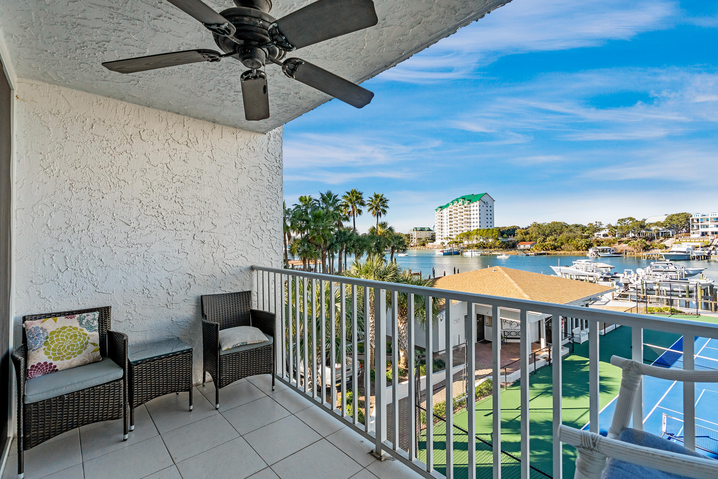 30 Moreno Point Road, Unit 303A Destin, FL 32541 - Photo 19 of 34 a view of a balcony with furniture