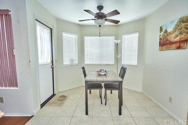 471 Silverado Street Barstow, CA 92311 - Photo 17 of 43 a room that has a window and a table in it