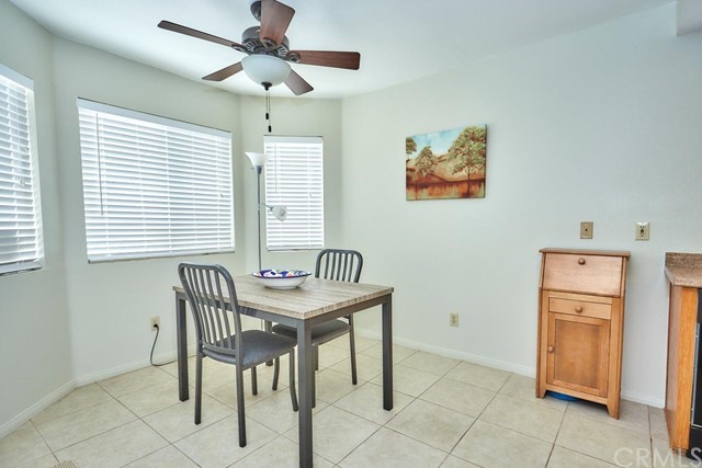 471 Silverado Street Barstow, CA 92311 - Photo 18 of 43 a dining room with furniture and window