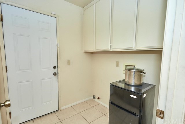 471 Silverado Street Barstow, CA 92311 - Photo 19 of 43 a kitchen with a sink and cabinets