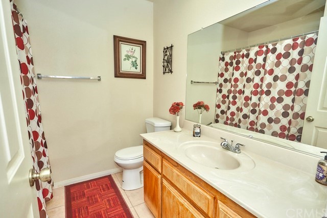 471 Silverado Street Barstow, CA 92311 - Photo 20 of 43 a bathroom with a sink and a toilet
