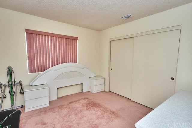 471 Silverado Street Barstow, CA 92311 - Photo 23 of 43 a view of an empty room with a window