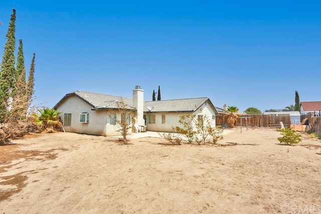 471 Silverado Street Barstow, CA 92311 - Photo 34 of 43 a view of a house with snow on the side of the road