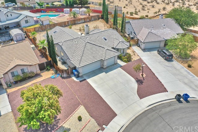 471 Silverado Street Barstow, CA 92311 - Photo 37 of 43 an aerial view of a house with a yard