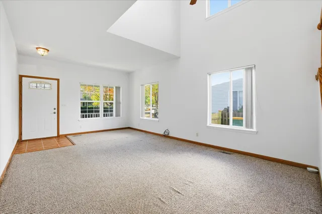 an empty room with windows