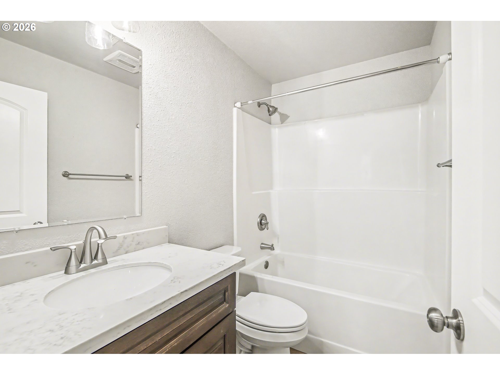 88192 Jameson Way Veneta, OR 97487 - Photo 18 of 44 a bathroom with a granite countertop sink mirror toilet and bathtub