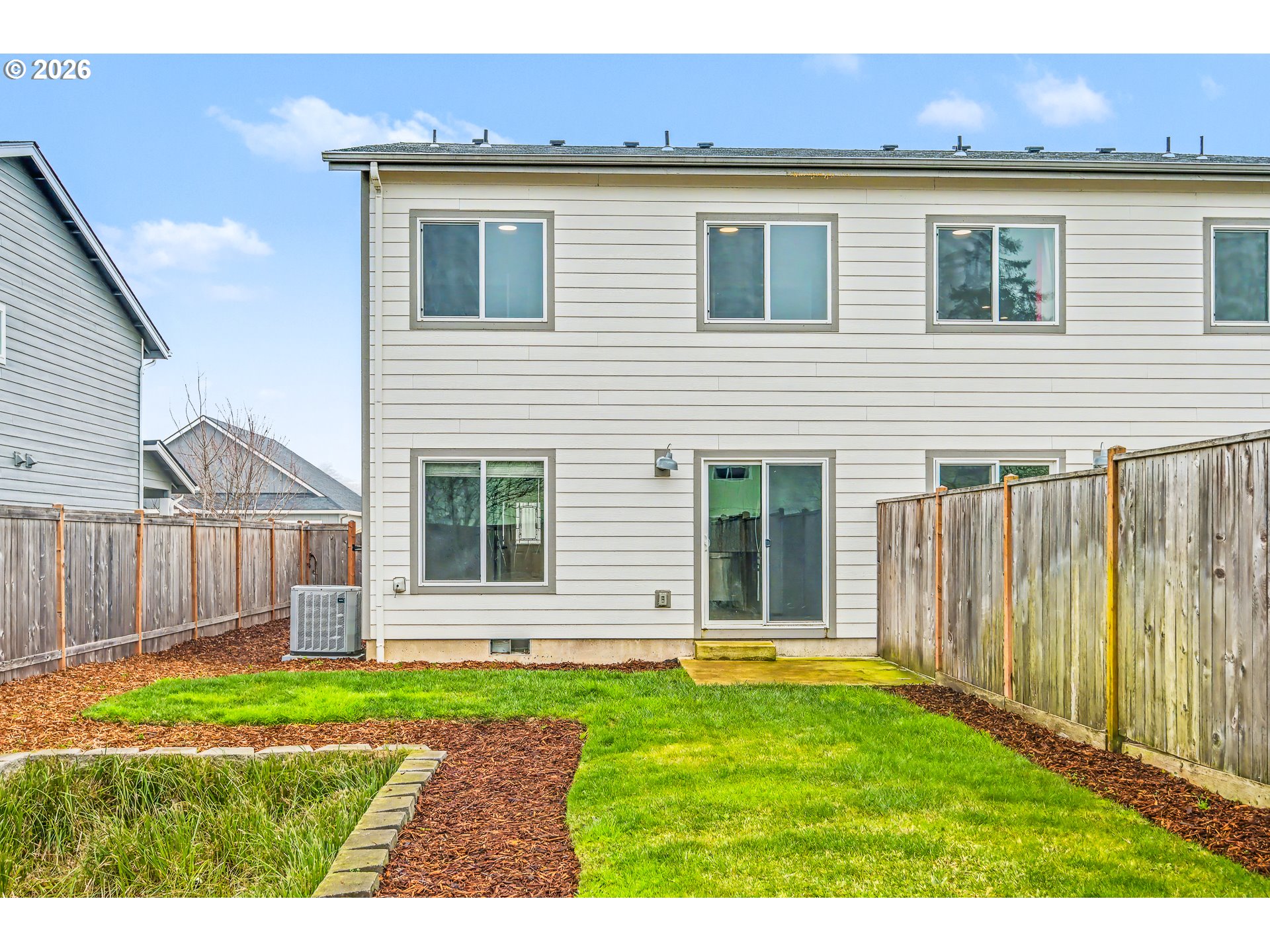 88192 Jameson Way Veneta, OR 97487 - Photo 24 of 44 a view of a house with backyard and wooden fence