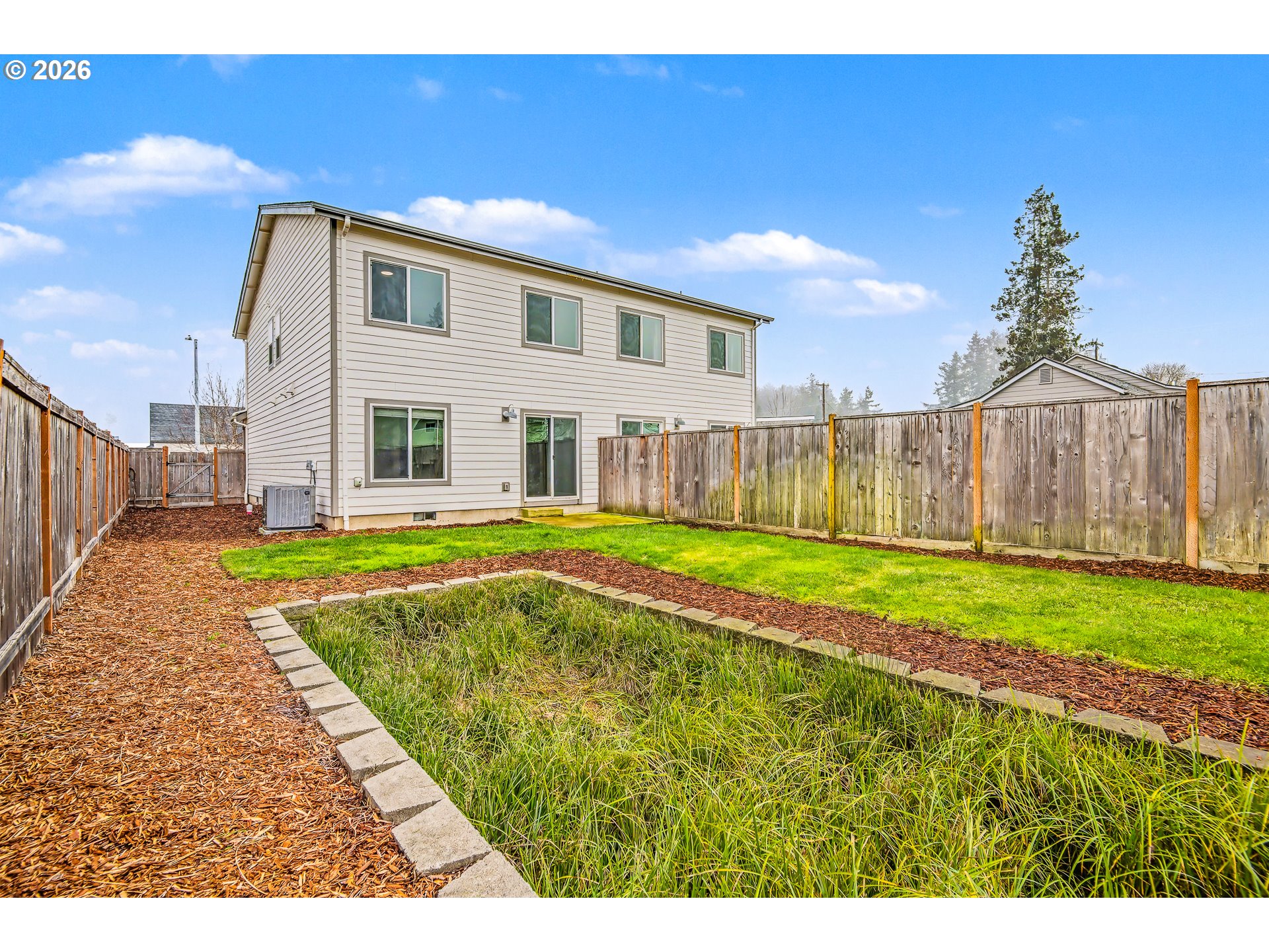 88192 Jameson Way Veneta, OR 97487 - Photo 26 of 44 a view of swimming pool with a yard and wooden fence