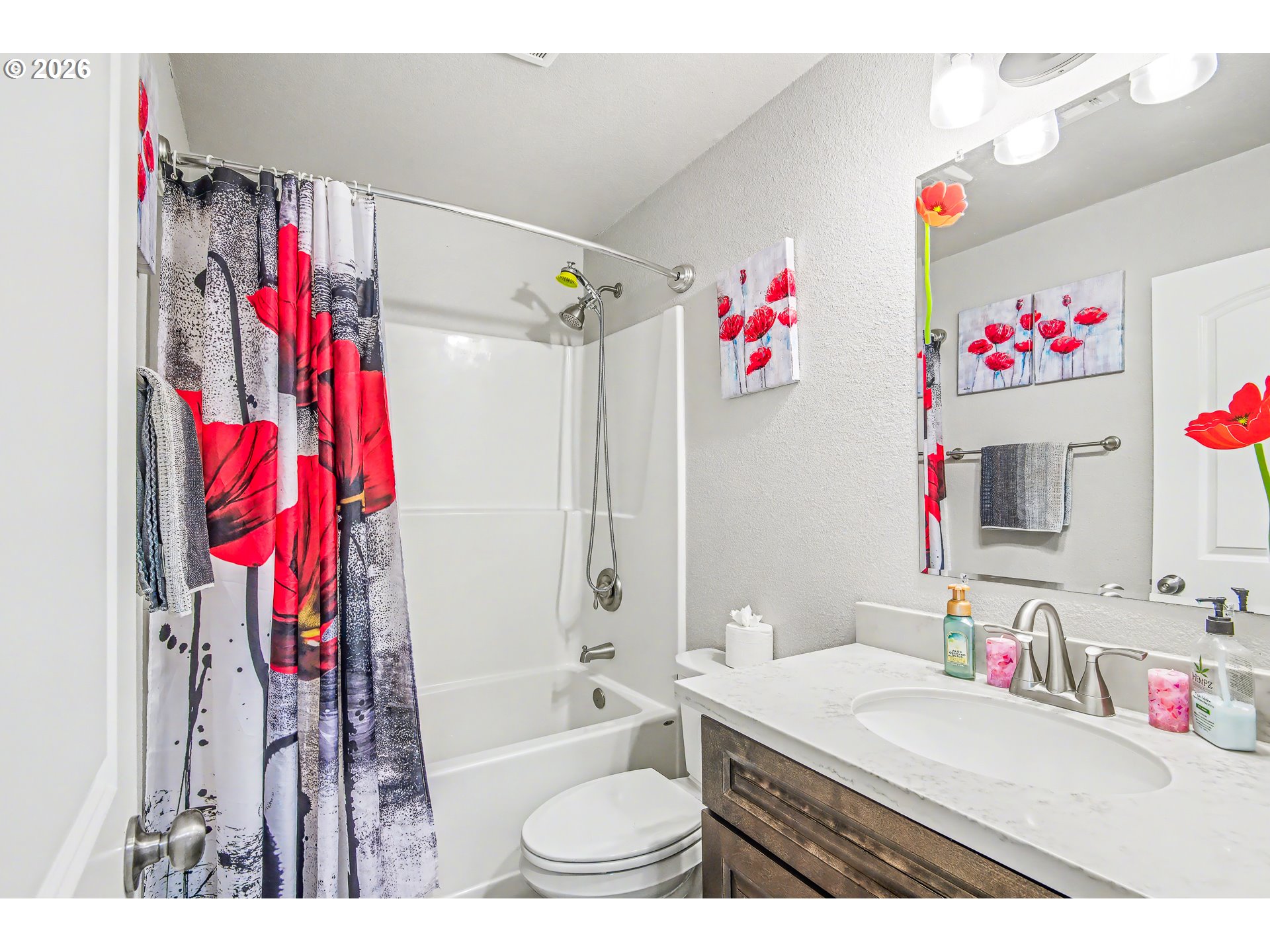 88192 Jameson Way Veneta, OR 97487 - Photo 37 of 44 a bathroom with a sink vanity mirror and a shower