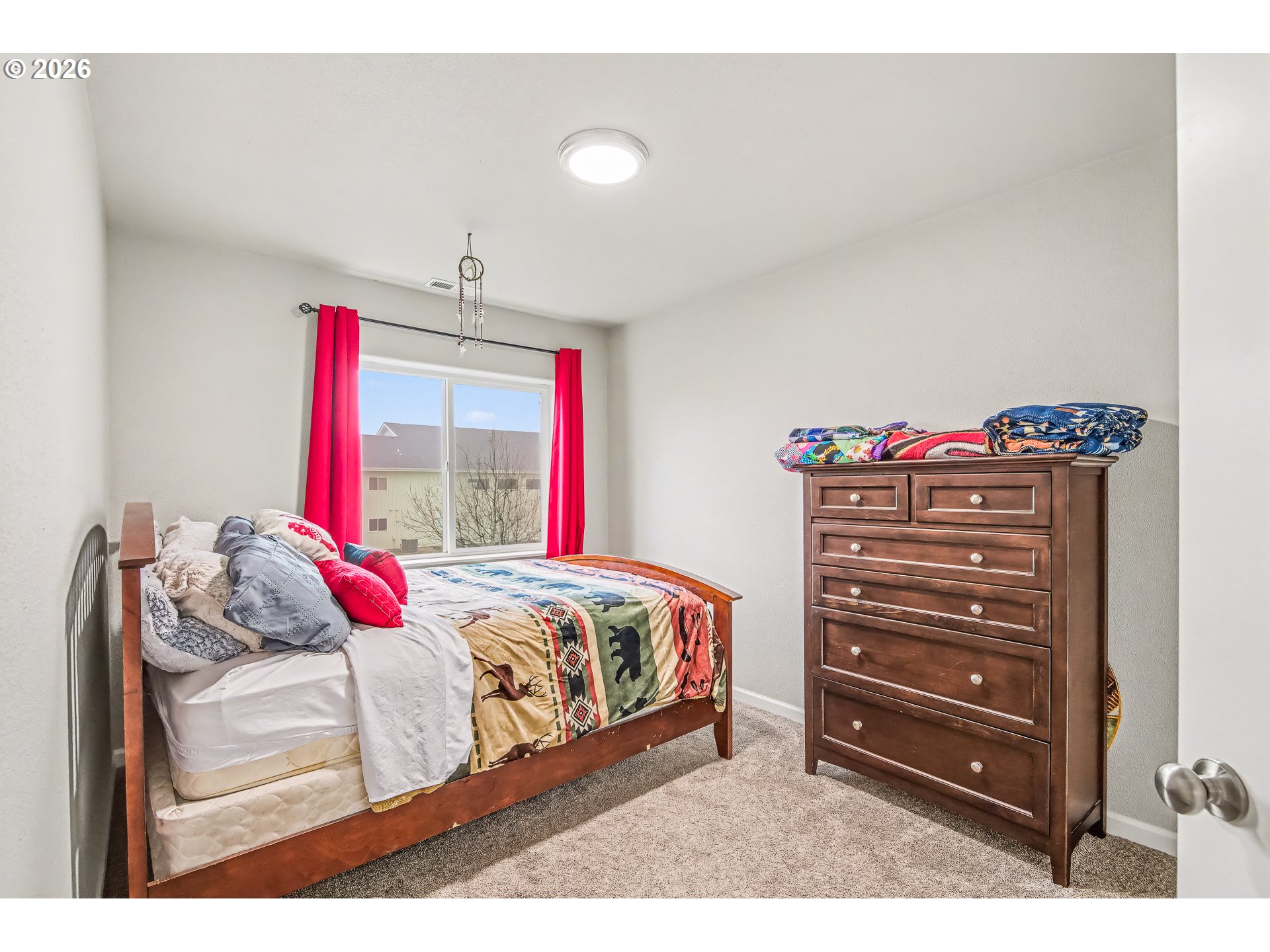 88192 Jameson Way Veneta, OR 97487 - Photo 39 of 44 a bedroom with a bed and a closet