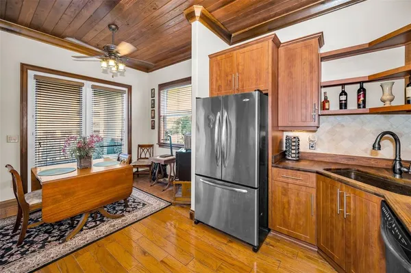 an aerial view of a house with a lake view