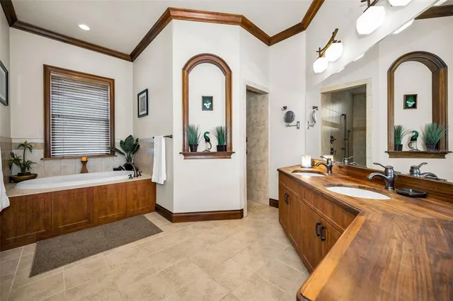 an aerial view of a house with a ocean view