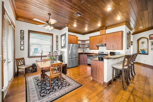 an aerial view of a house with a ocean view