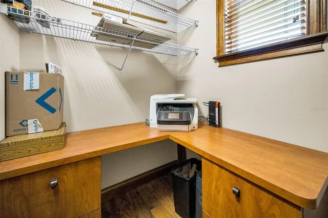 a view of a swimming pool with a yard