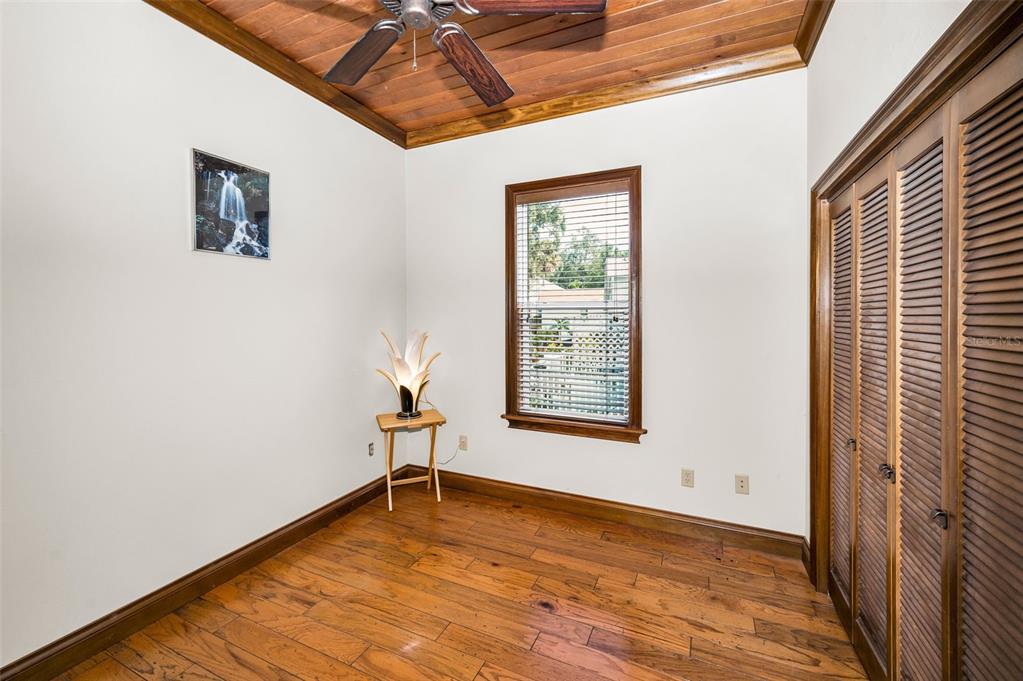 6141 Lafayette Street New Port Richey, FL 34652 - Photo 32 of 98 a view of empty room with wooden floor and fan