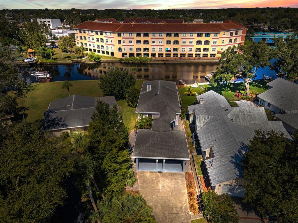 6141 Lafayette Street New Port Richey, FL 34652 - Photo 41 of 98 an aerial view of a house with a lake view