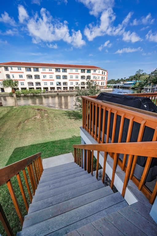 6141 Lafayette Street New Port Richey, FL 34652 - Photo 46 of 98 a balcony with wooden floor and city view