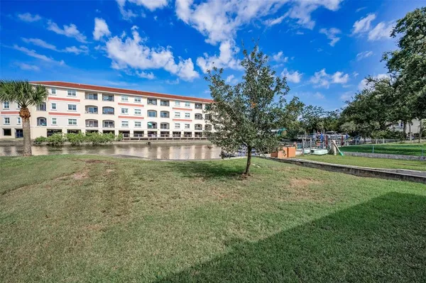 a view of a building with a street