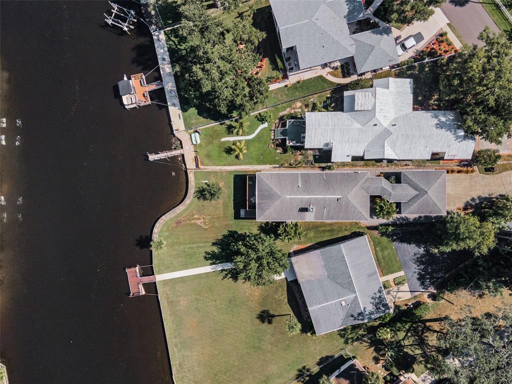 6141 Lafayette Street New Port Richey, FL 34652 - Photo 58 of 98 an aerial view of a house with a yard