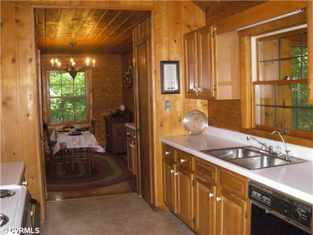 4261 Pierce Road Powhatan, VA 23139 - Photo 5 of 12 Kitchen - New sink, counters, range & floor.