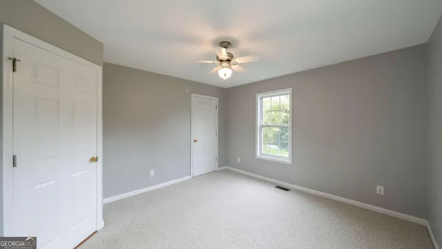 an entryway in a room with a window
