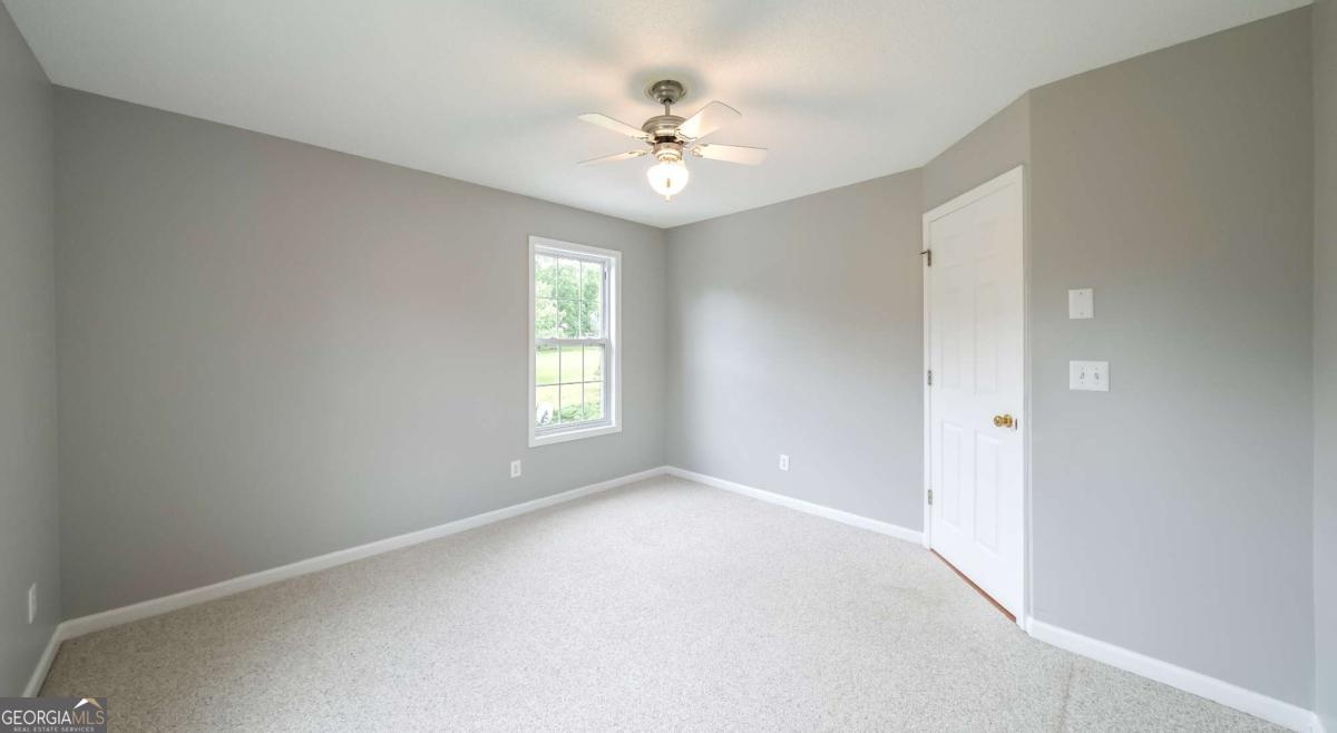 45 Buell Jones Road Carrollton, GA 30117 - Photo 34 of 60 a view of a livingroom with a window
