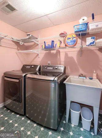 a room with wooden floor and a window