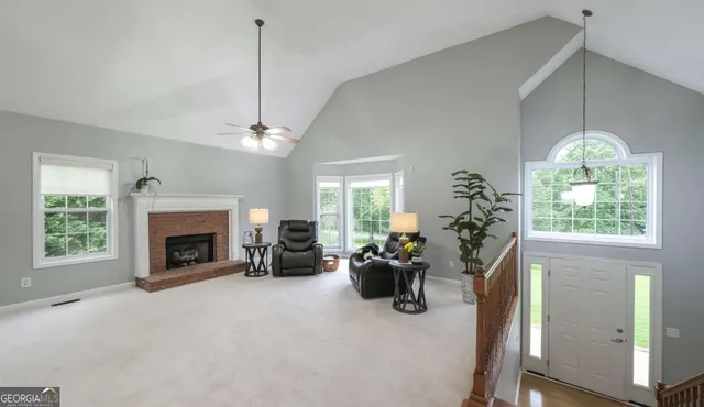 a bed room with furniture and a chandelier