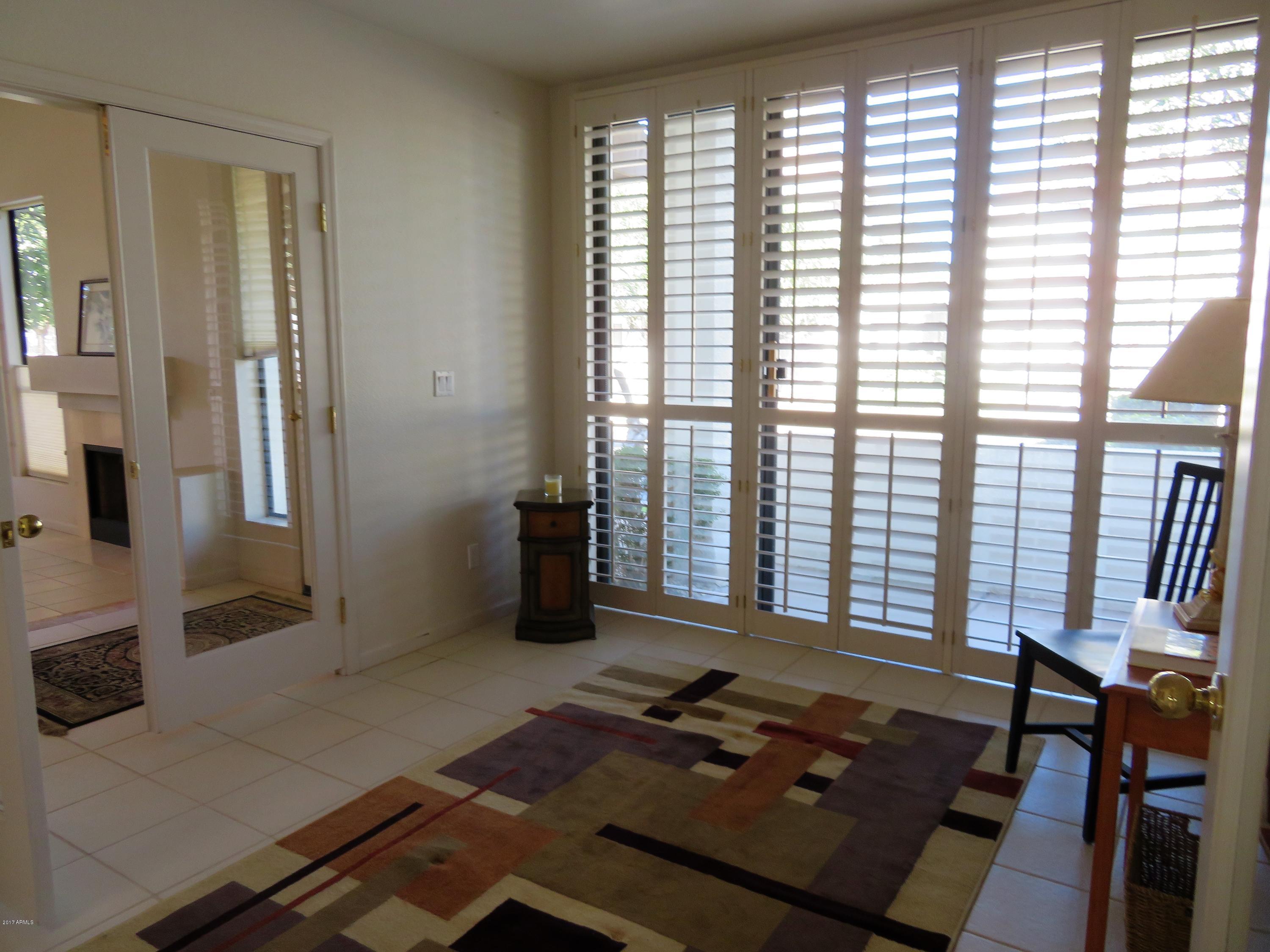 7222 East Gainey Ranch Road, Unit 114 Scottsdale, AZ 85258 - Photo 18 of 53 SHUTTERS IN DEN/STUDY