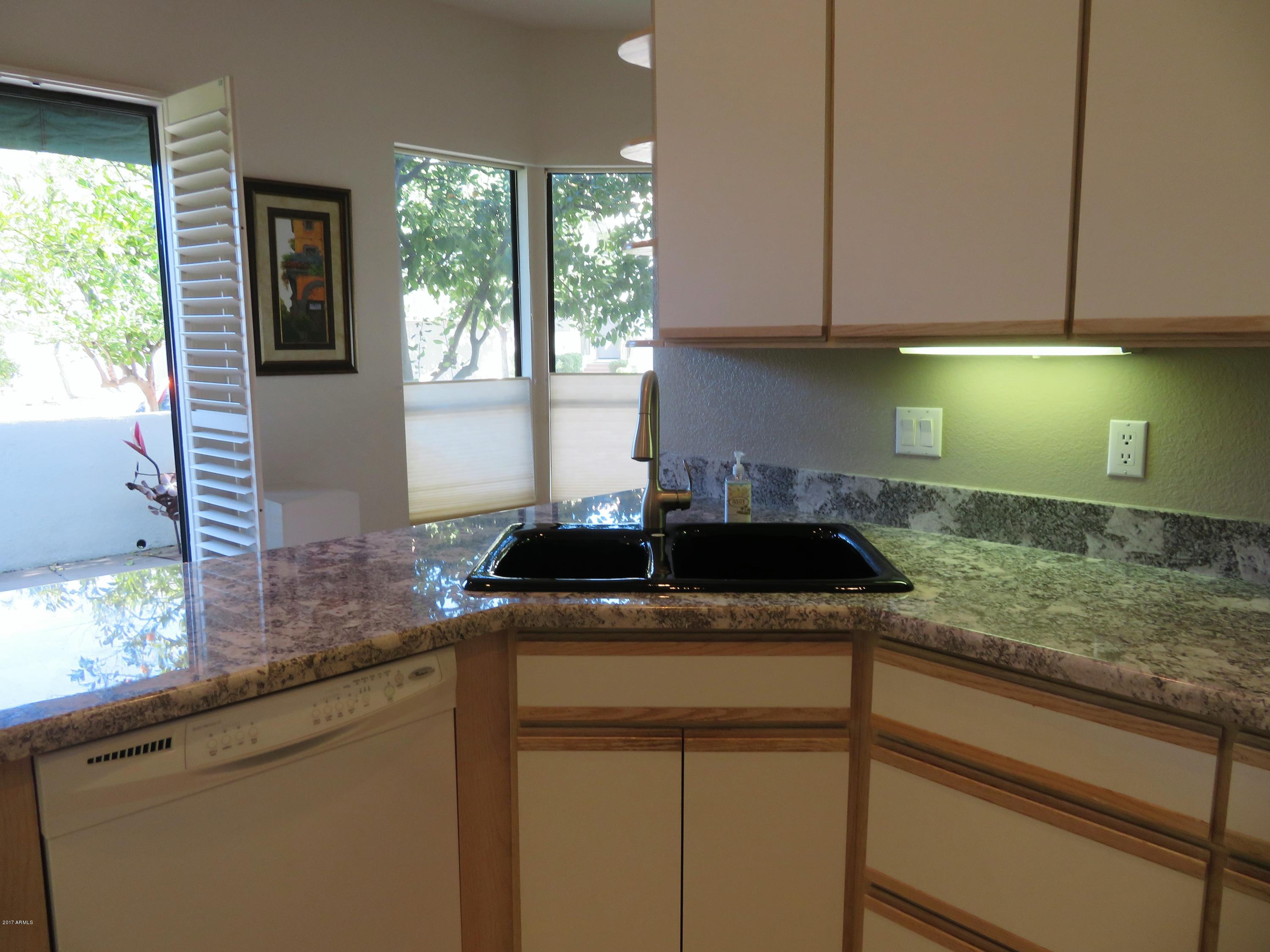 7222 East Gainey Ranch Road, Unit 114 Scottsdale, AZ 85258 - Photo 27 of 53 NEW GRANITE COUNTERS