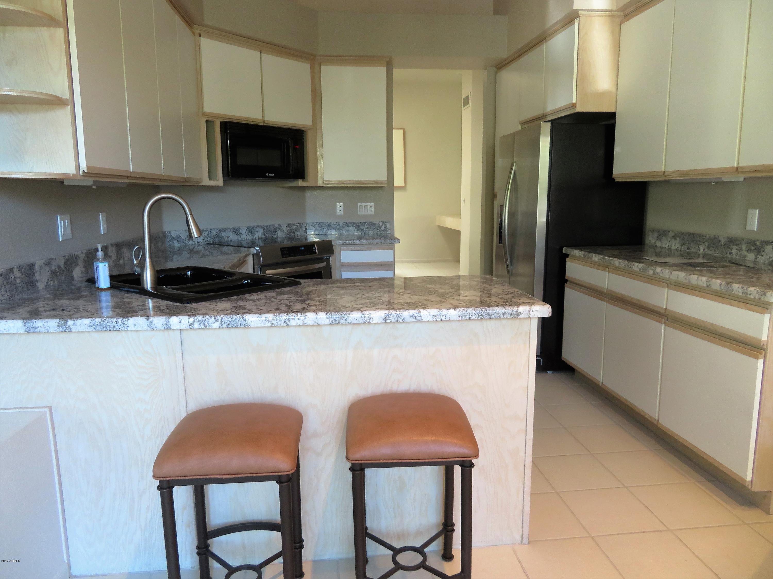 7222 East Gainey Ranch Road, Unit 114 Scottsdale, AZ 85258 - Photo 28 of 53 BREAKFAST BAR