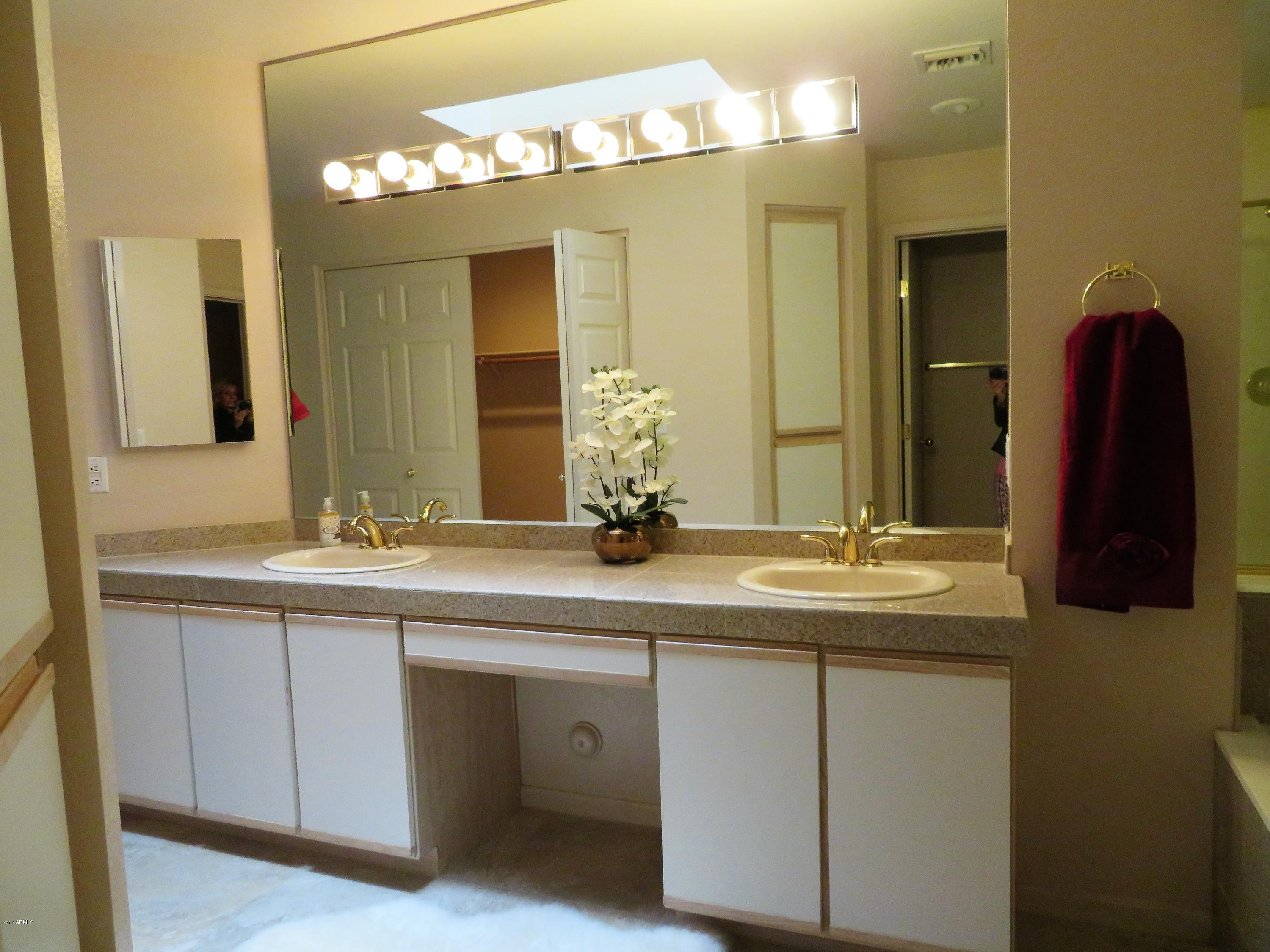 7222 East Gainey Ranch Road, Unit 114 Scottsdale, AZ 85258 - Photo 34 of 53 GRANITE COUNTERS ON DOUBLE SINKS